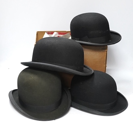 Four black gentlemen’s bowler hats and a collection of spats, gloves etc. Condition - hats dusty but in good condition, gloves fair